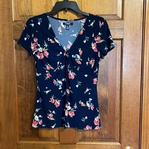 Chaps classic navy and flowers shirt with cap sleeves.